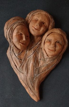 Tres mujeres, hermanas de la esperanza clay, ink, 9 X 6 X 2" by Brenna Busse
