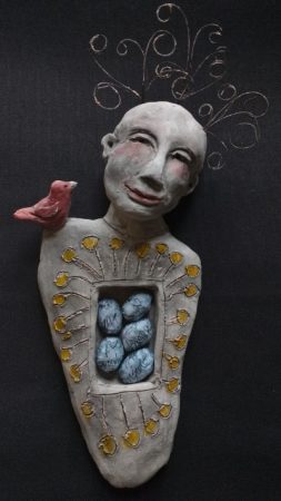 Come closer: telling secrets · clay,ink, paint, misc · 12 X 5 X 2"